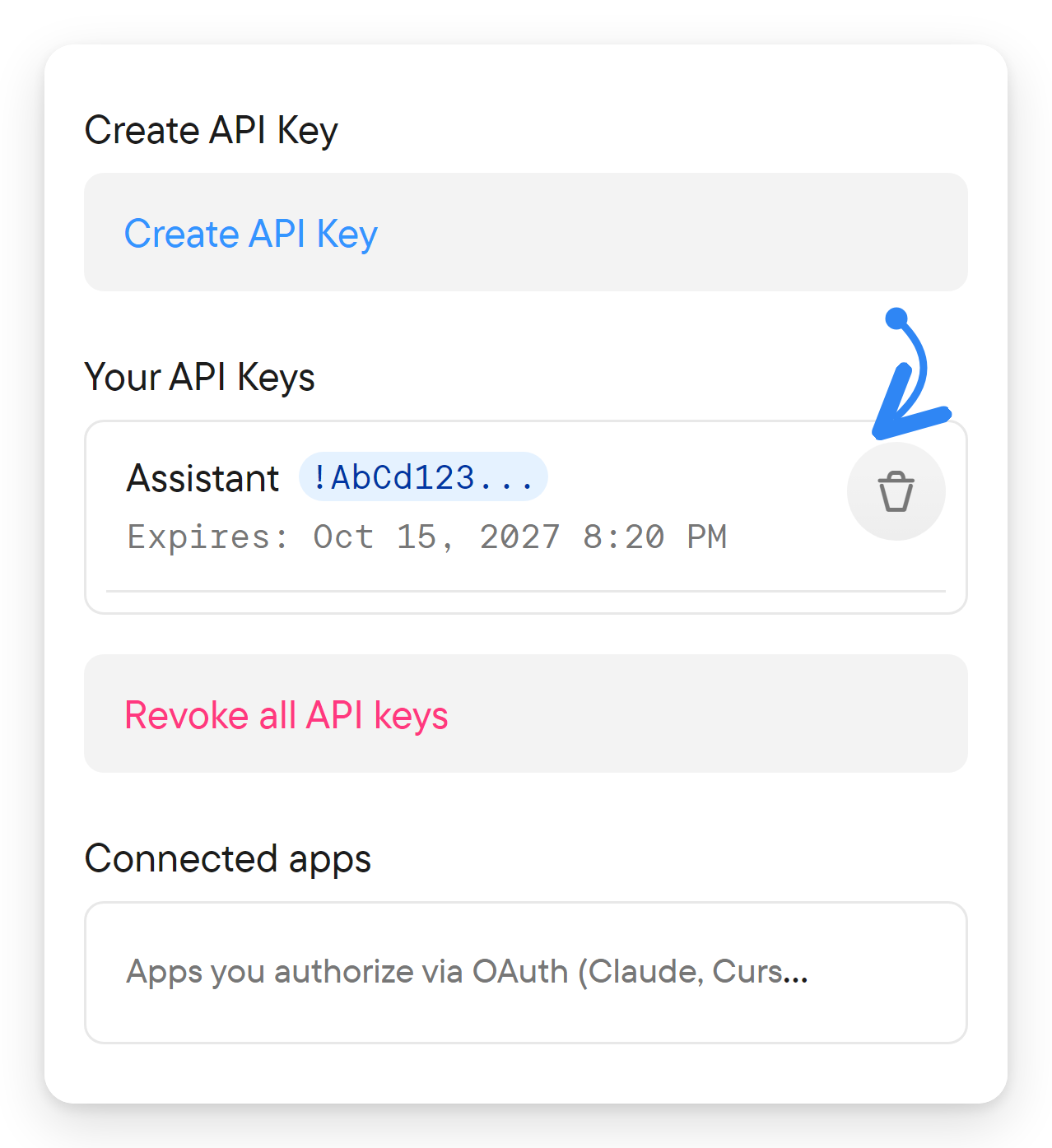 The key list with a trash button on an active key and a Revoke all API keys button.